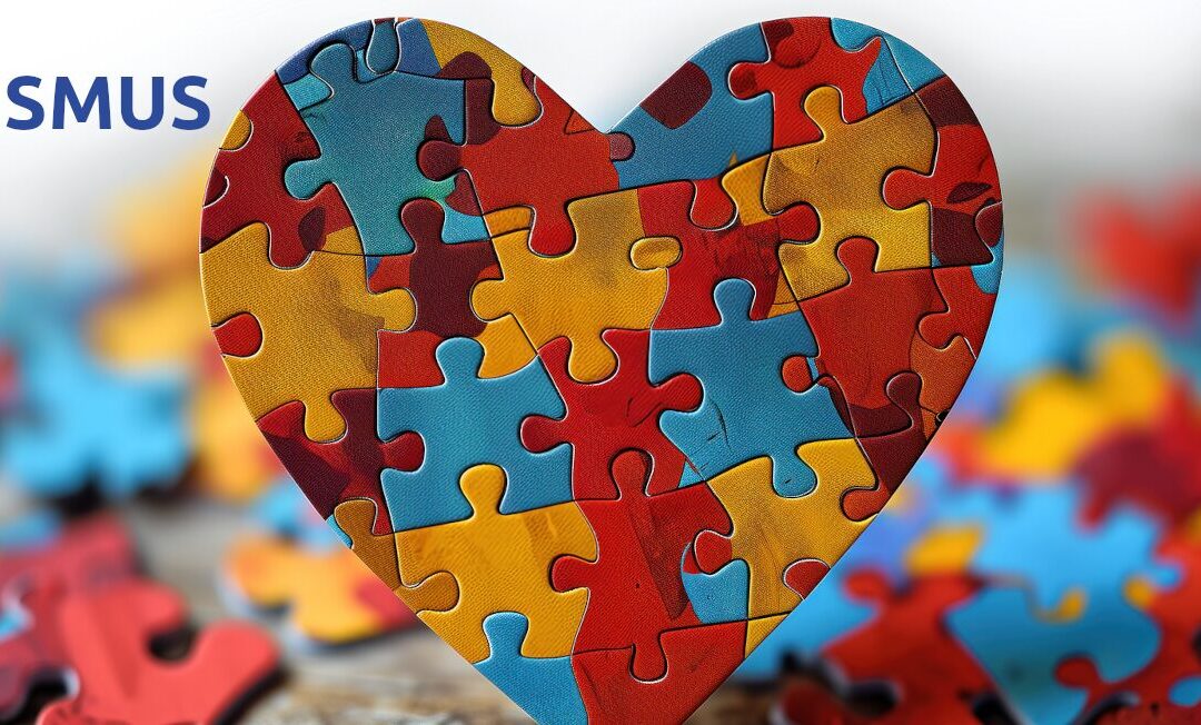Ein aufrecht stehendes Herz aus Puzzle-Teilen, die die Farben des Welt-Autismus-Tages tragen.